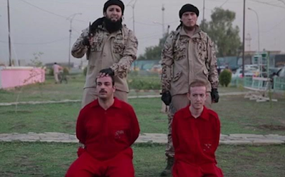 (Photos/video) – ISIS beheads two ‘spies’ in front of children in Iraq, threaten France president Hollande with more attacks